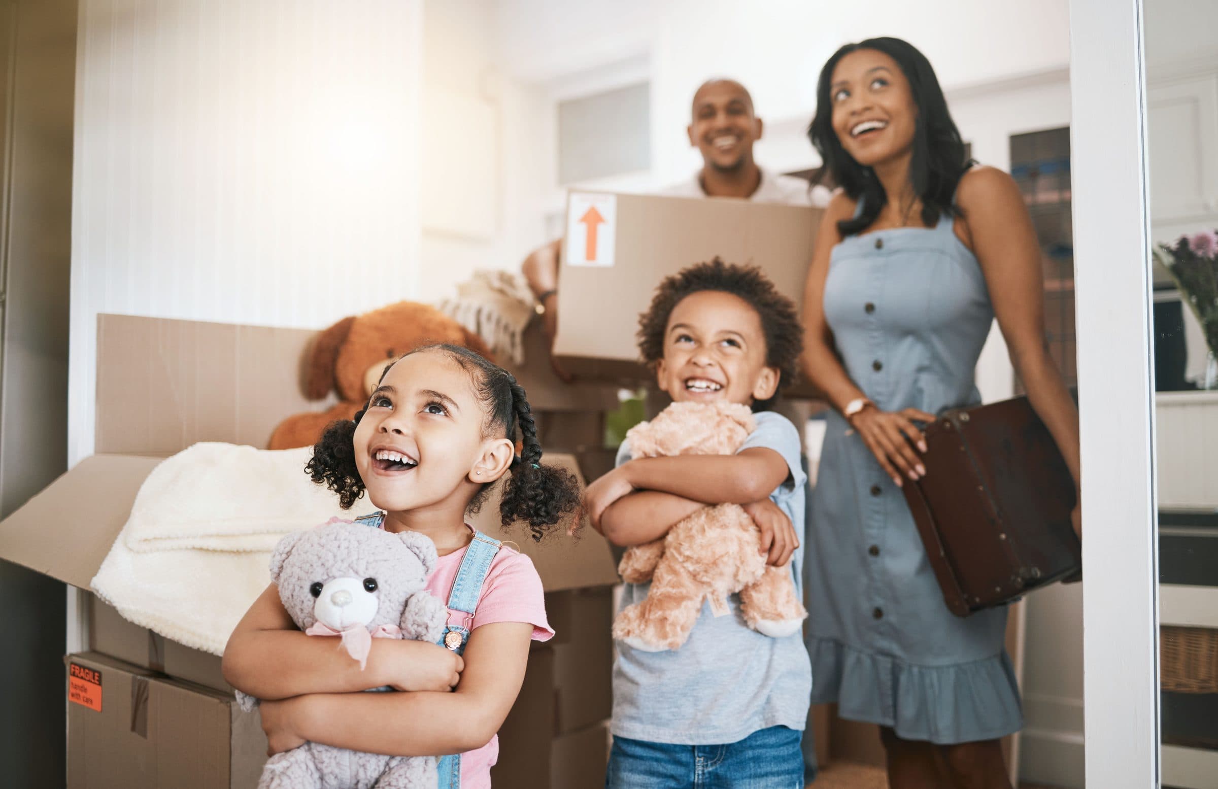 A family moving into their Mid South Best Rentals home