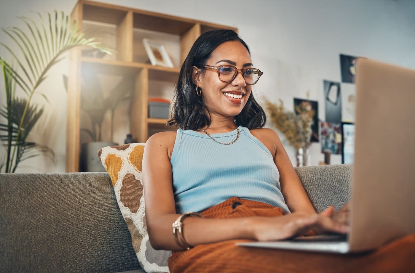 A resident managing her lease online from her living room